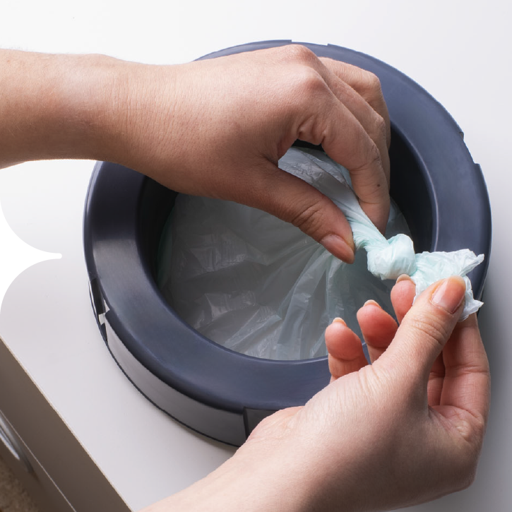 Krok 2 - Povytáhněte fólii a zavažte uzel